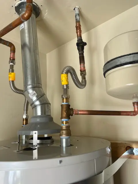 Water heater installation and plumbing repair in Delgado